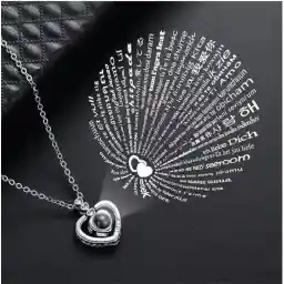 Hartje ketting - 100 Talen - I Love You - Liefdes Cadeau - Valentijn Cadeautje voor Hem / Haar - Zilverkleurig