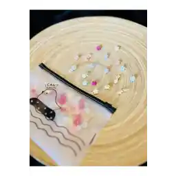 تزیین موی رنگی پاستلی 48 تکه MASSANO / مهره های بافتنی با کیف شفاف