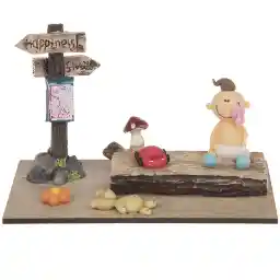 عروسک خمیری آیس تویز مدل بچه روی نیمکت پارک